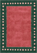 Rectangular rug designed in a modern style with scattered white spot patterns on a pink background