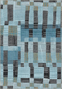 Geometric rug designed with modern block patterns on a light blue background. Adding elegance to a contemporary living space.